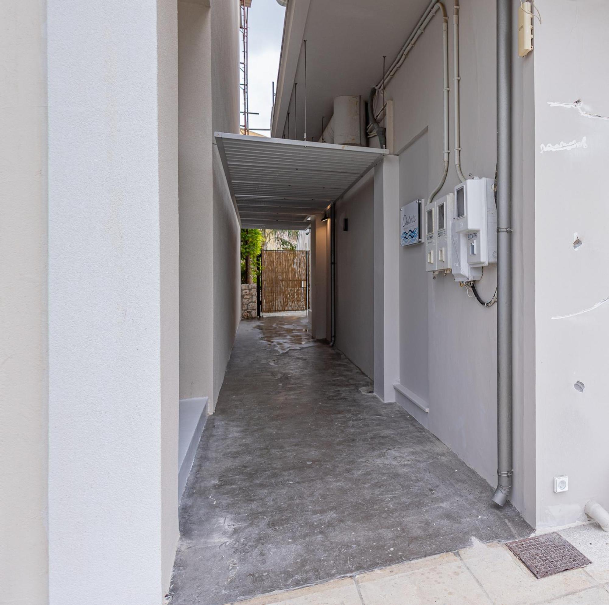 Chelmis Sea Front Apartments - Atlantis Argostoli  Bagian luar foto